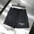 Urban Elegance: Waterproof Givenchy Shorts" - Black