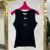 Chic and Edgy: Cut Sleeve Celine Shirt - Black