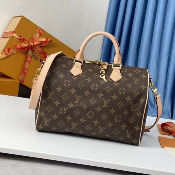 "Timeless Elegance: Louis Vuitton Medium Handbag - 30x20x18 cm"