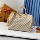 "Timeless Elegance: Louis Vuitton Medium Handbag - 30x20x18 cm"