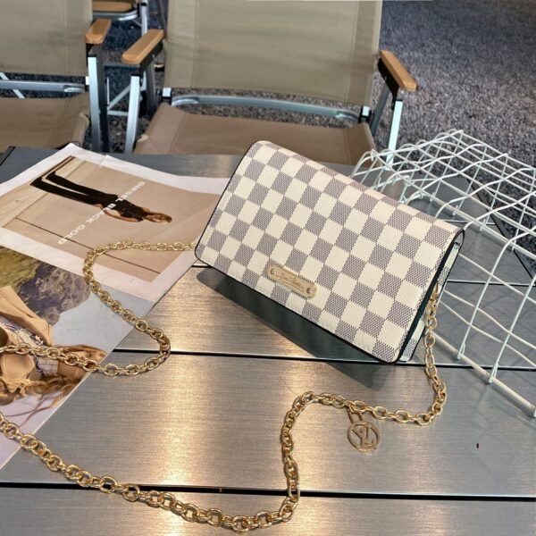 "Louis Vuitton Elegance: Sling Bag in Original Box"