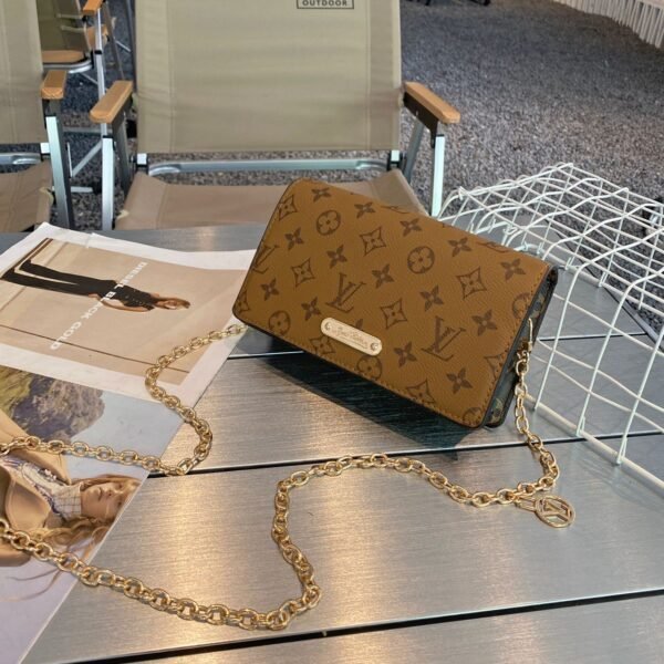 "Louis Vuitton Elegance: Sling Bag in Original Box"