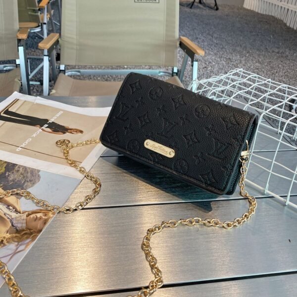 "Louis Vuitton Elegance: Sling Bag in Original Box"