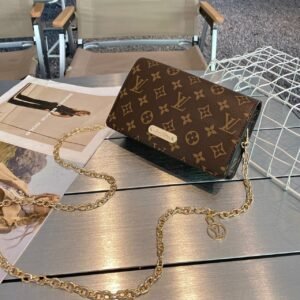 "Louis Vuitton Elegance: Sling Bag in Original Box"