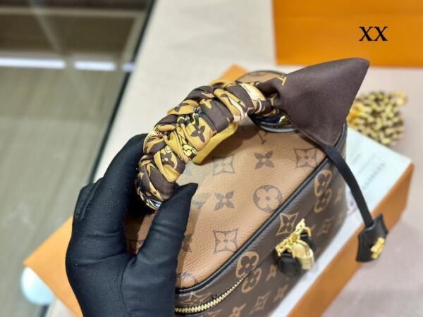 "Chic Companion: Louis Vuitton Handbag - Embrace Iconic Luxury"