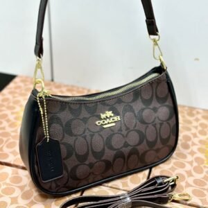 "Timeless Sophistication: Coach Shoulder Bag in Elegant Presentation Box".