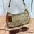 "Timeless Sophistication: Coach Shoulder Bag in Elegant Presentation Box". - camel