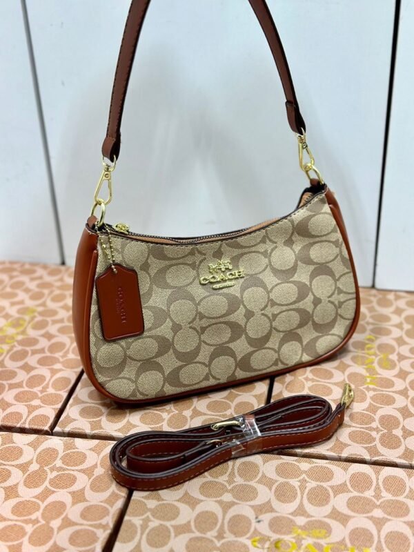 "Timeless Sophistication: Coach Shoulder Bag in Elegant Presentation Box".