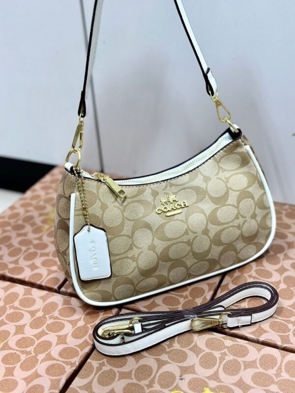 "Timeless Sophistication: Coach Shoulder Bag in Elegant Presentation Box".