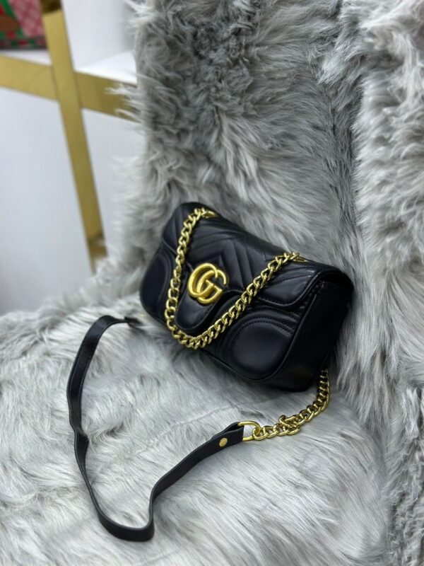 "Gucci Glamour: Best-Selling Sling Bag - Your Icon of Style"