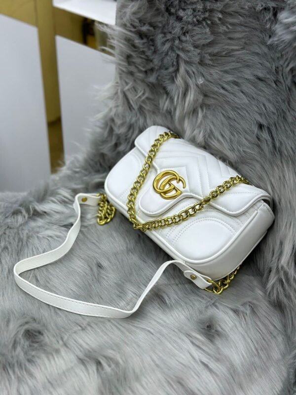 "Gucci Glamour: Best-Selling Sling Bag - Your Icon of Style"