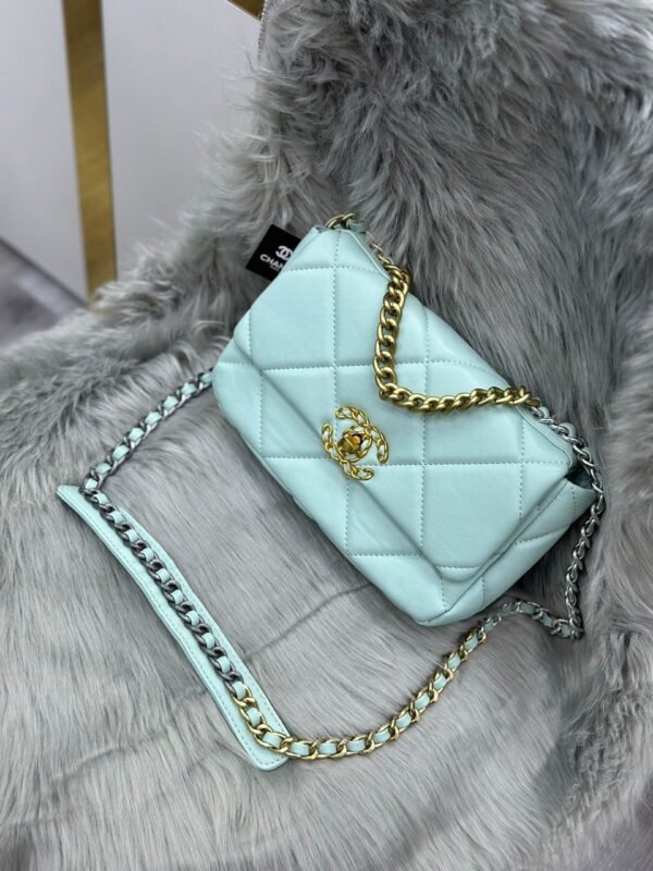 "Chic Companion: Chanel Sling Bag - Embrace Effortless Elegance"