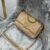 "Chic Companion: Chanel Sling Bag - Embrace Effortless Elegance" - Biege