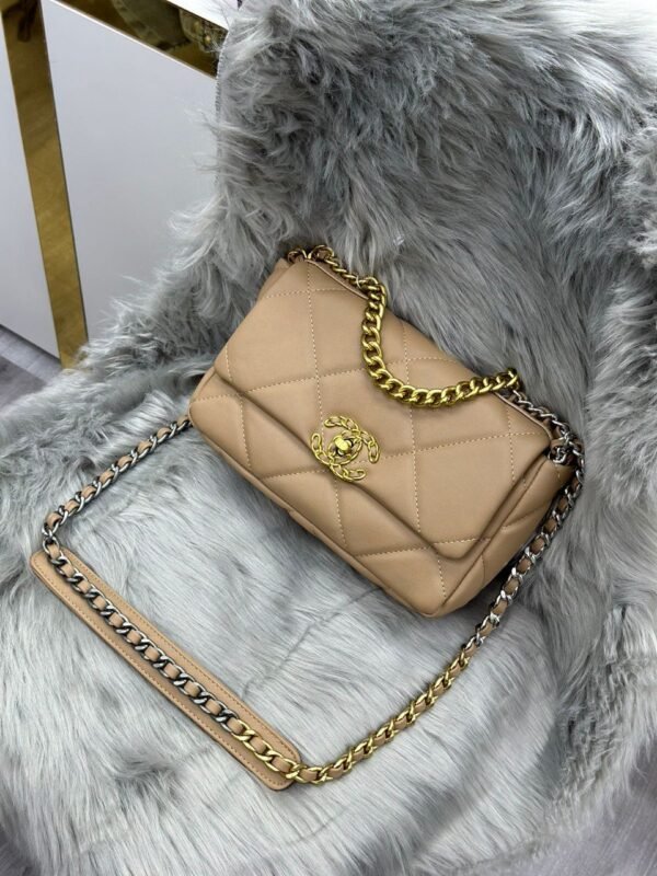 "Chic Companion: Chanel Sling Bag - Embrace Effortless Elegance"