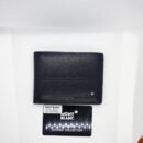 "Refined Essentials: High-Quality Men's Wallets from Gucci, Montblanc, and Prada"