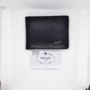 "Refined Essentials: High-Quality Men's Wallets from Gucci, Montblanc, and Prada"