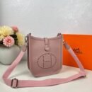 Indulge in luxury with our Hermes Sling Bag, a masterpiece , accompanied by an elegant box for a complete experience.