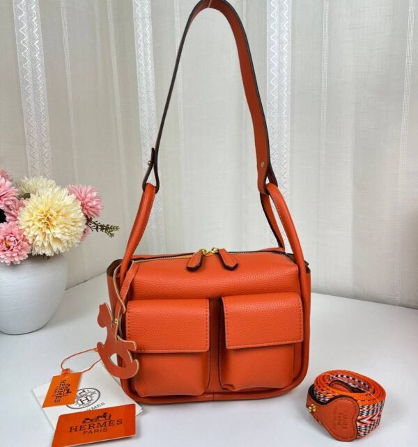 Unveil the epitome of luxury with our Hermes Shoulder Bag featuring a versatile sling strap, with original box