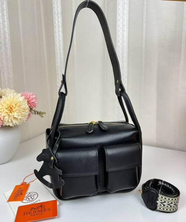 Unveil the epitome of luxury with our Hermes Shoulder Bag featuring a versatile sling strap, with original box