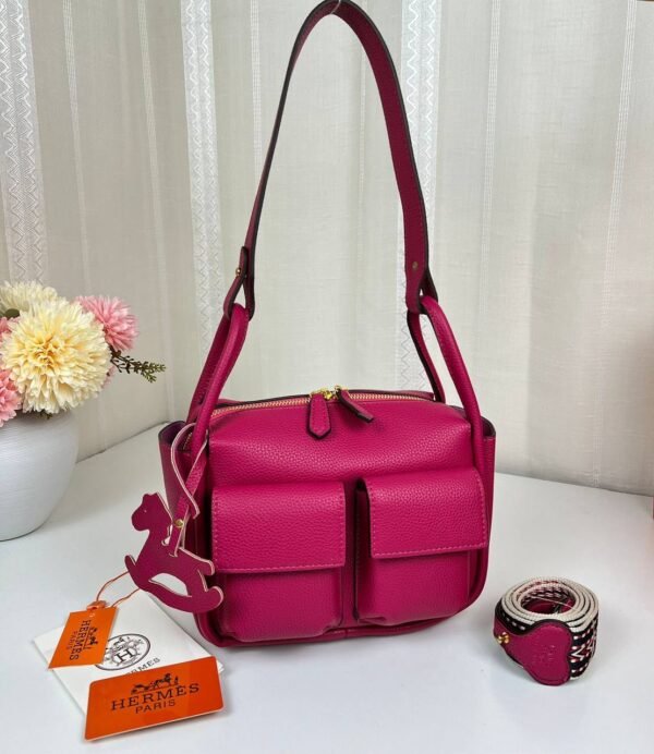 Unveil the epitome of luxury with our Hermes Shoulder Bag featuring a versatile sling strap, with original box