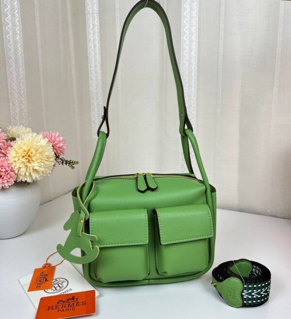 Unveil the epitome of luxury with our Hermes Shoulder Bag featuring a versatile sling strap, with original box