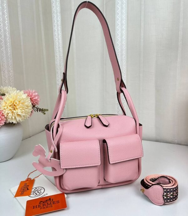 Unveil the epitome of luxury with our Hermes Shoulder Bag featuring a versatile sling strap, with original box
