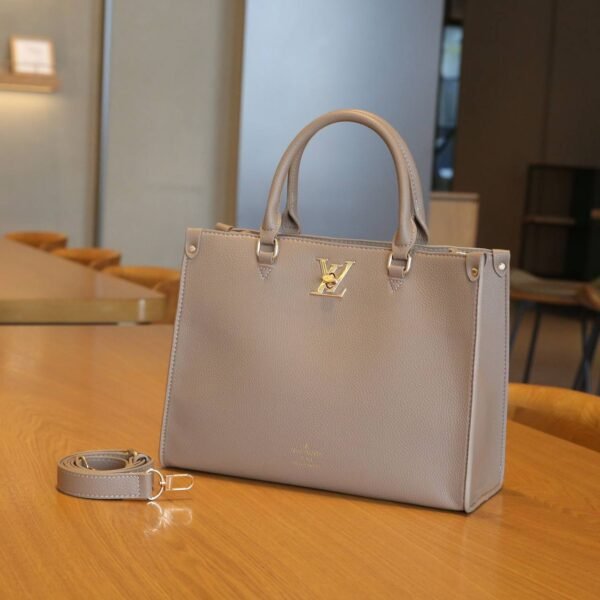 Elevate your elegance with the Louis Vuitton Tote Bag, a sophisticated masterpiece  With Box