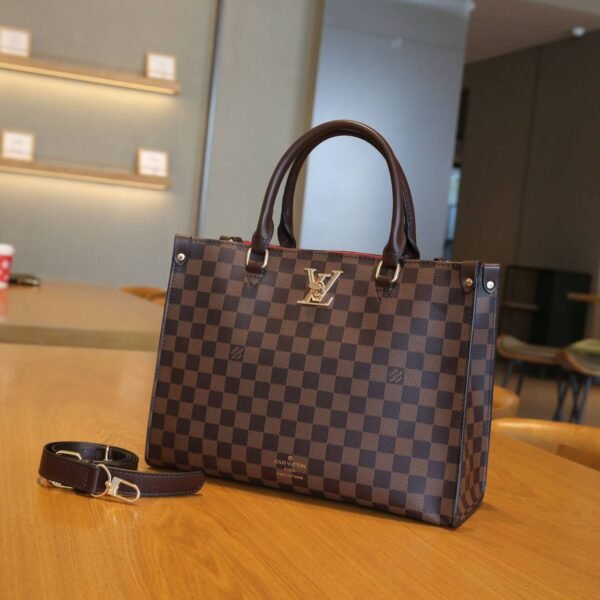 Elevate your elegance with the Louis Vuitton Tote Bag, a sophisticated masterpiece  With Box