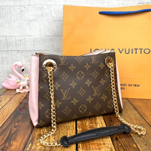 Step into luxury with the Louis Vuitton Sling Bag, a compact and stylish accessory measuring 24*17*10 cm.