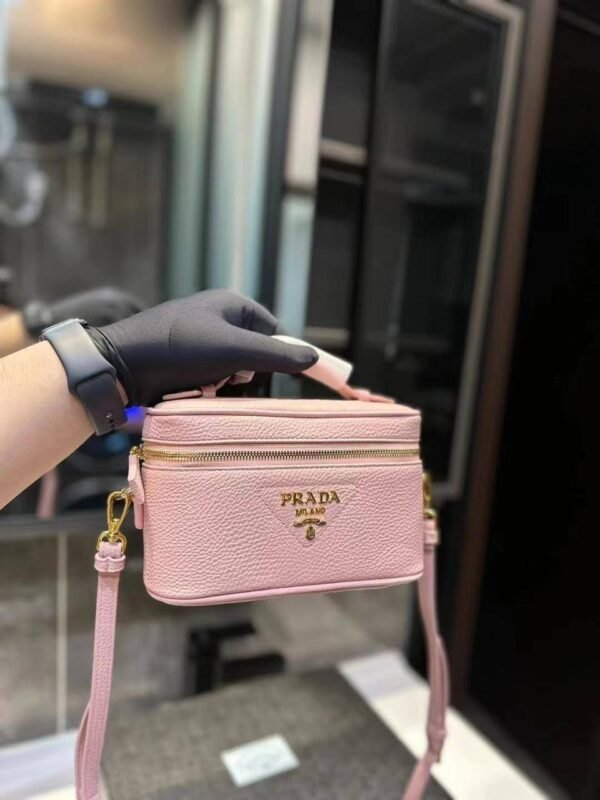 Introducing the epitome of elegance – our Prada Handbag. Crafted with meticulous attention to detail