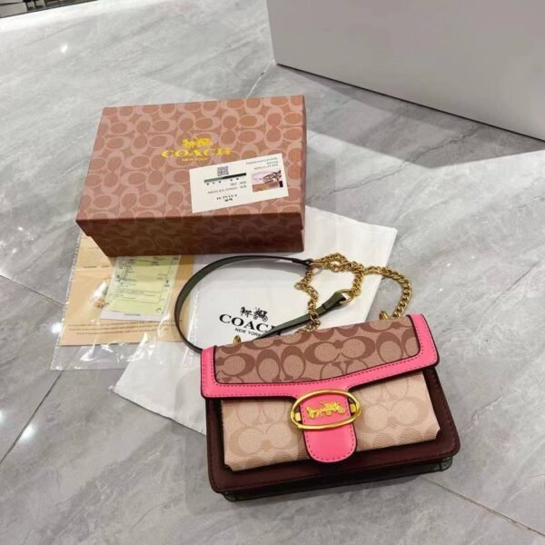 Discover contemporary allure with the Coach Sling Bag – a second-copy gem presented in its stylish box.