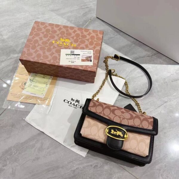 Discover contemporary allure with the Coach Sling Bag – a second-copy gem presented in its stylish box.