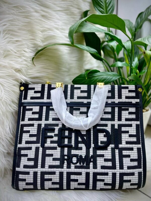 Fendi Tote Bag, a sleek blend of style and functionality. Crafted with impeccable precision,