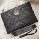 our exquisite clutch bag. With dimensions of 28 x 18.5 cm, it's compact yet spacious enough to hold your essentials with ease.