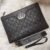 our exquisite clutch bag. With dimensions of 28 x 18.5 cm, it's compact yet spacious enough to hold your essentials with ease. - 2