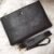 our exquisite clutch bag. With dimensions of 28 x 18.5 cm, it's compact yet spacious enough to hold your essentials with ease. - 3
