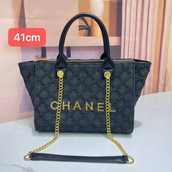 the Chanel tote bag 41 cm, it seamlessly blends timeless elegance with practicality.this bag boasts a sling belt for versatile carrying options