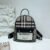 ultimate backpack trifecta: Burberry, Coach, and Michael Kors. Each brand brings its own unique style and functionality to the table. - 11