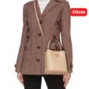 Prada handbag. Crafted with exquisite attention to detail and packaged in its original box