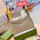 Gucci shoulder bag, adorned with the iconic logo and packaged in its original box 24 cm