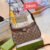 Gucci shoulder bag, adorned with the iconic logo and packaged in its original box 24 cm - 1