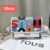 the versatile and stylish Tous sling bag, designed for both men and women with a size of 26cm - 11