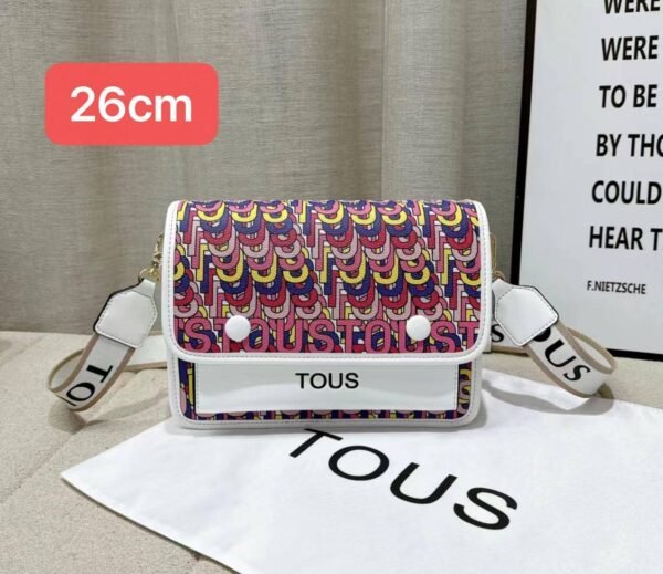 the versatile and stylish Tous sling bag, designed for both men and women with a size of 26cm