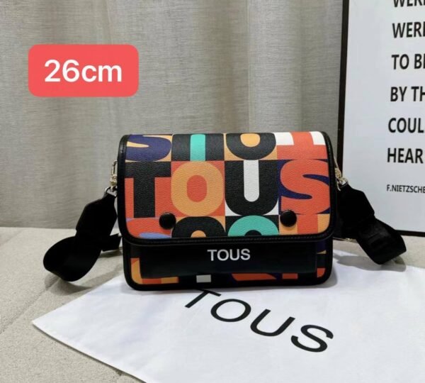 the versatile and stylish Tous sling bag, designed for both men and women with a size of 26cm
