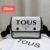 the versatile and stylish Tous sling bag, designed for both men and women with a size of 26cm - 8