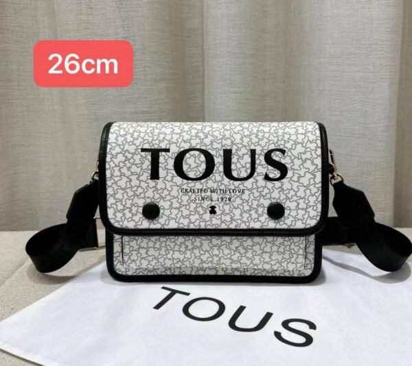the versatile and stylish Tous sling bag, designed for both men and women with a size of 26cm
