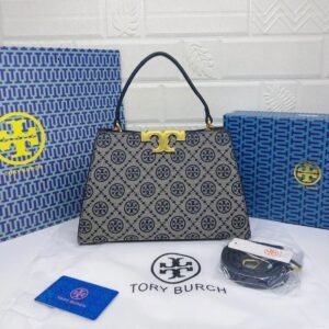Troy Burch handbag, a perfect blend of elegance and practicality. Measuring 27 cm