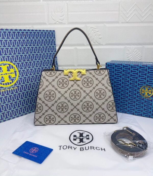 Troy Burch handbag, a perfect blend of elegance and practicality. Measuring 27 cm
