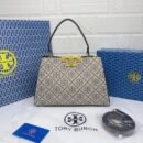 Troy Burch handbag, a perfect blend of elegance and practicality. Measuring 27 cm - 1
