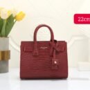 Saint Laurent handbag. With a compact size of 22 cm, this handbag seamlessly combines style and functionality - 4